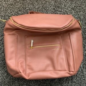 Rose gold Fawn design purse.
